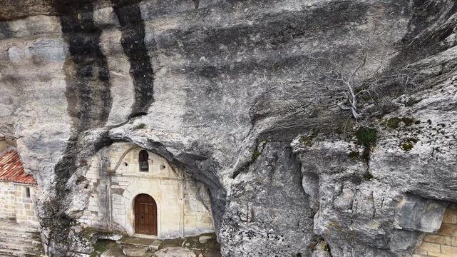 Ojo guare&ntilde;a hermitage built into rock cliff