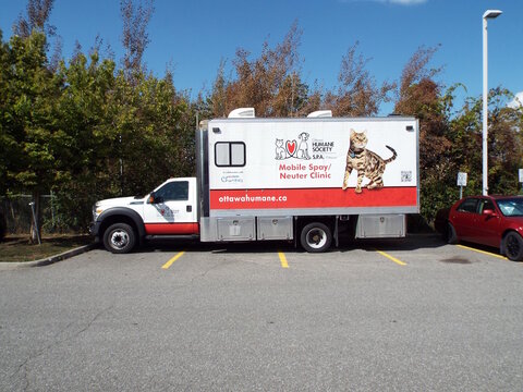 Ottawa, Ontario, Canada-July 17, 2025: An "Ottawa Humane Society" mobile spay and neuter clinic truck on W Hunt Club Rd.