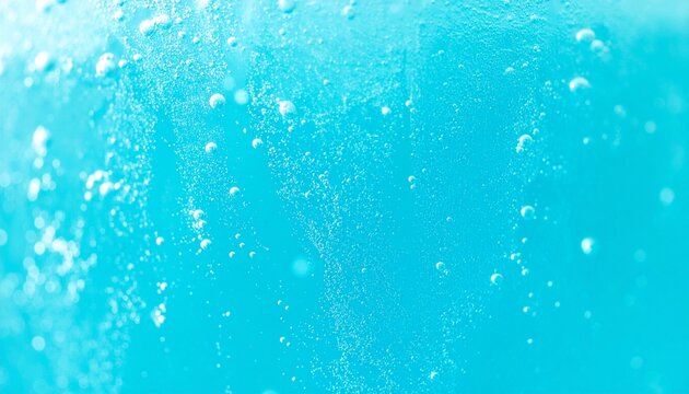 ラムネソーダの泡が広がる爽やかなブルーの炭酸ドリンク背景