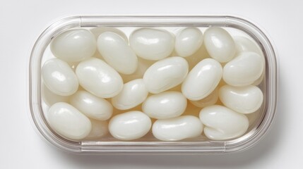 Glossy White Jelly Beans in a Clear Plastic Package Top View