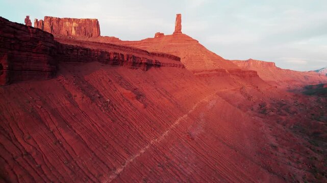 Drone Flight Through Narrow Slot Canyon At Castleton Tower Revealing Expansive Red Rock Desert Panorama Of Moab Under Sunlit Sky, Cinematic Aerial Landscape &mdash; 21 November 2025.