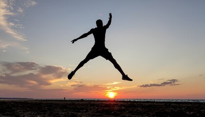 Dynamic silhouette of a person joyfully leaping high into the air against a vibrant, breathtaking sunset over the tranquil ocean, symbolizing freedom and an active healthy lifestyle