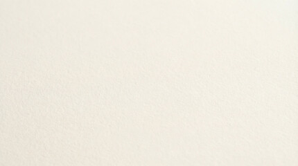 Fototapeta premium Soft ivory paper texture background with fine grain and warm off-white tones, clean minimal surface ideal for premium stationery luxury brand or elegant corporate design