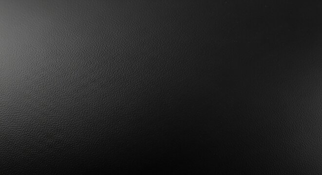 A dark and textured background with a subtle gradient of gray tones