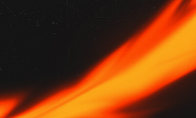 Glowing orange light leak flows across a grainy black background for vintage film overlay.