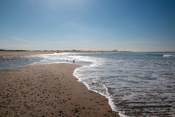 Sea glass hunting gravel sand beach at Surfers Knoll beach in Ventura California United States