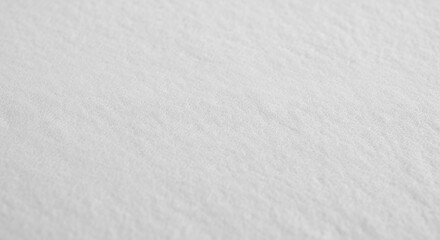 Obraz premium A close-up view of a textured white surface with a rough, uneven finish