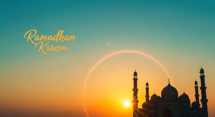 Obraz premium Ramadan Kareem greeting with mosque silhouette at sunset.