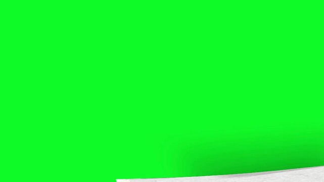 White textured paper sheet being torn and ripped away to reveal a bright chroma key green screen background for creative video transition effects