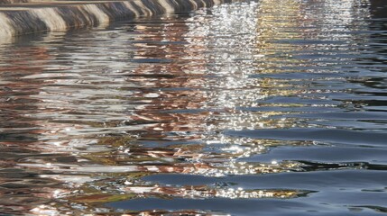 Rippling patterns of light reflecting on disturbed water surface creating dynamic abstract textures
