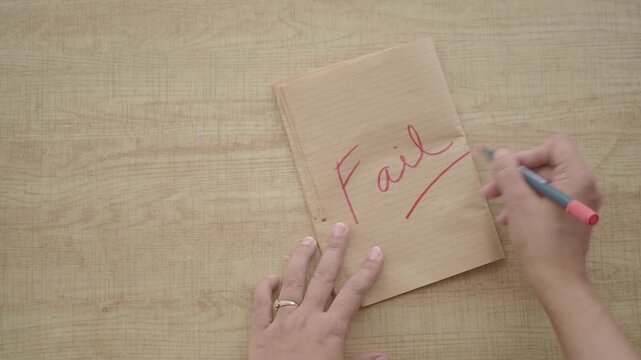 Drawing a red line on a wooden surface