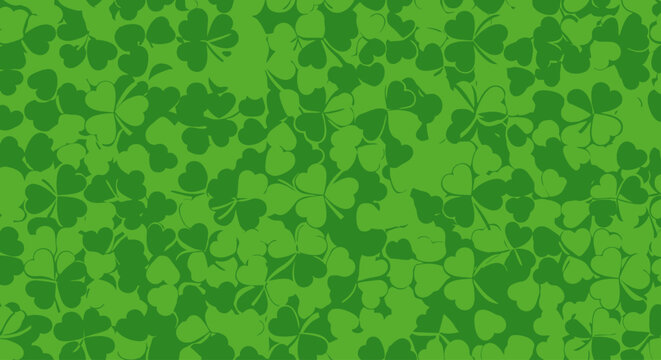 Seamless pattern of green clover leaves on transparent background silhouette