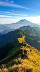 A serene mountain range with lush greenery under a blue sky