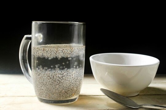 chia seeds in a glass of water on the table