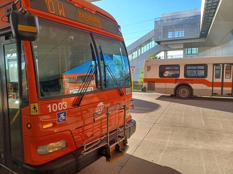 Orange bus stands at Kipling bus terminal, Toronto