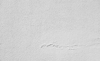 White textured wall background, rough white plaster surface