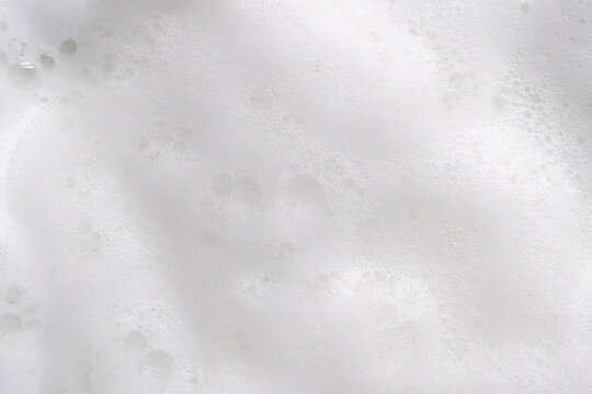 Closeup abstract white soap foam bubbles texture background