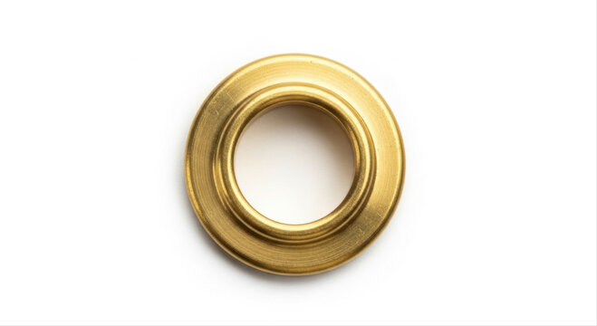 Golden grommet ring elegantly isolated on a pristine white background, showcasing its smooth metallic finish and circular design
