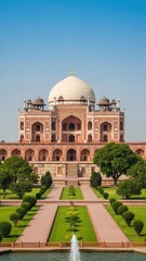 Naklejka premium Majestic Humayun's Tomb, a Mughal architectural marvel in Delhi, India, bathed in sunlight with manicured gardens and a fountain.