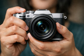Woman Holding Mirrorless Digital Camera with Lens