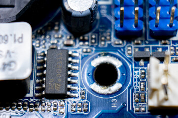 Close-up of a part of an electronic circuit board with electronic components