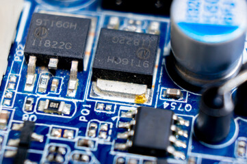 Close-up of a part of an electronic circuit board with electronic components