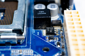 Close-up of a part of an electronic circuit board with electronic components