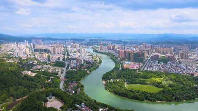 Chongqing Cityscape with Turquoise River and Mountains Aerial View