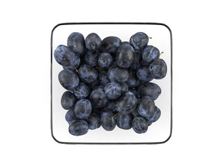 Glass bowl with plums