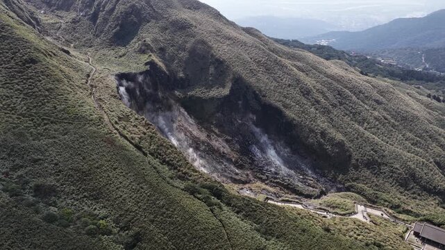 Geothermal fumaroles venting steam on yangmingshan mountain