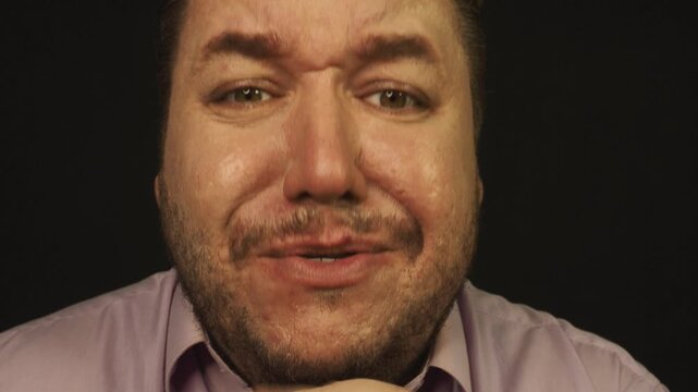 A grown man cries, prays and hopes for a miracle.