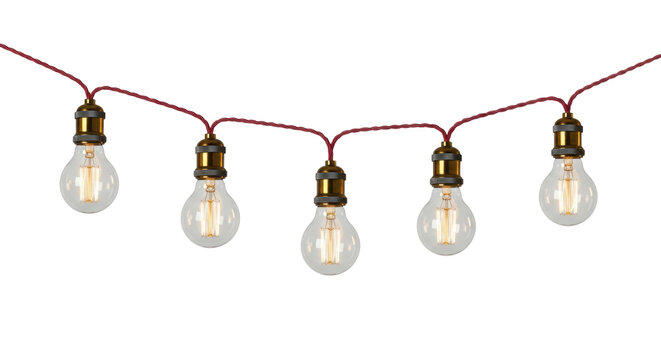 Isolated warm light string with five vintage Edison bulbs on flexible cord with sockets