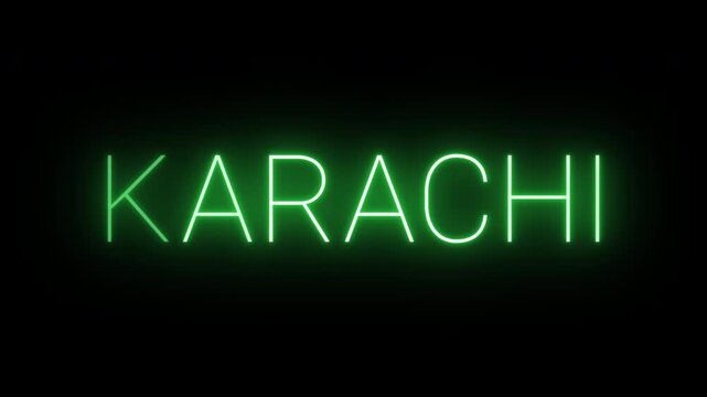Flickering neon green glowing karachi sign animated on black background.
