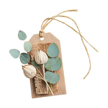 Eco friendly paper gift tag with dried leaves and twine natural