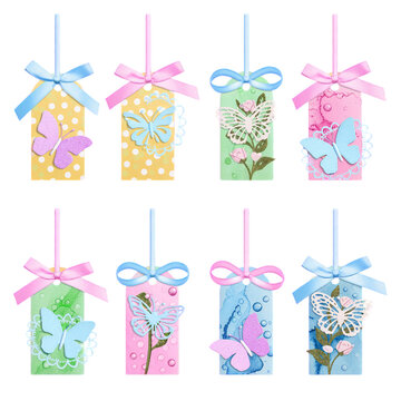 Assortment of pastel handmade tags with butterfly and floral butterflies flowers
