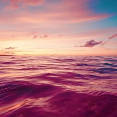 Fototapeta premium The ocean is calm and the sky is a beautiful pink color
