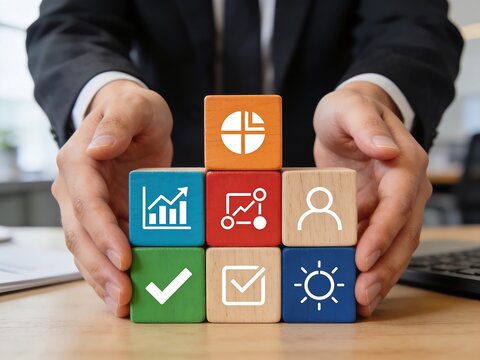 Total Quality Management Concept  Business Professional Holding TQM Quality Control Blocks in Modern Office