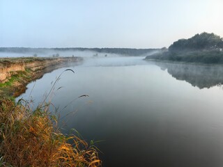 Morning fog over the river, summer landscape.