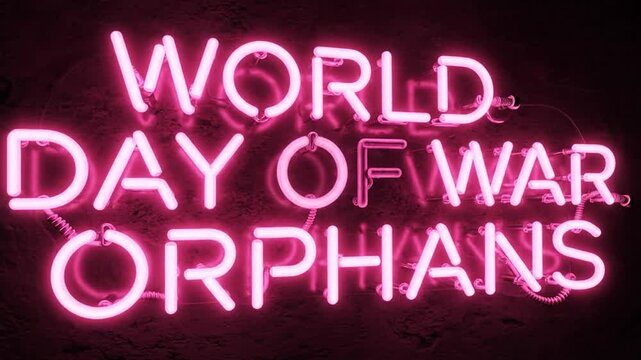 Pink neon sign displays World Day of War Orphans message