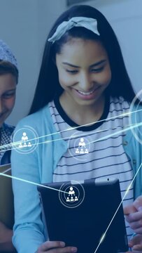 Vertical video: Teenager holding tablet students tapping screen starting moving links for education