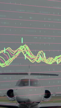 Vertical video: Jet taxiing to cam pilot starting taxi, aviation waveforms over pink grid on jet