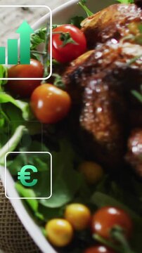 Vertical video: Cam panning to bowl causing icons fading and rising over chicken showing food stats