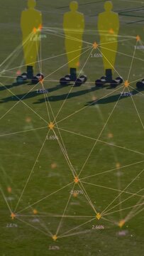 Vertical video: Player moving ball right, overlay showing nodes, wall, keeper diving, soccer drill
