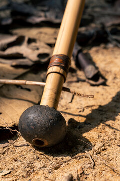 Close up of a traditional wooden blowpipe weapon used by the Orang Asli in Taman Negara Malaysia
