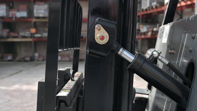 Close up hydraulic system of forklift industrial machinery mechanical detail. High quality 4k footage