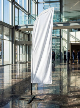 White blank mockup feather flag standing indoor marble floor conference center glass foyer corporate event advertising banner template design