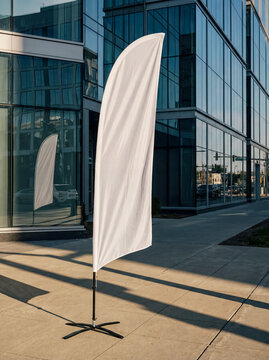 White blank mockup feather flag standing modern business center glass facade outdoor advertising event exhibition banner template design corporate