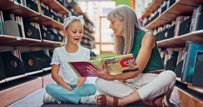 Grandmother, child and reading with book in library for story, fantasy or fairy tale at bookstore. Happy grandma and excited little girl or young kid with novel for literature, education or knowledge