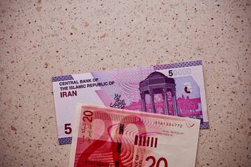 nowy izraelski szekel i  rial irański, banknoty © Marcin Łazarczyk