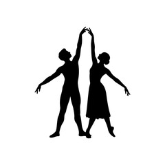 Silhouette of a male and female ballet dancers in graceful pose. © Erik